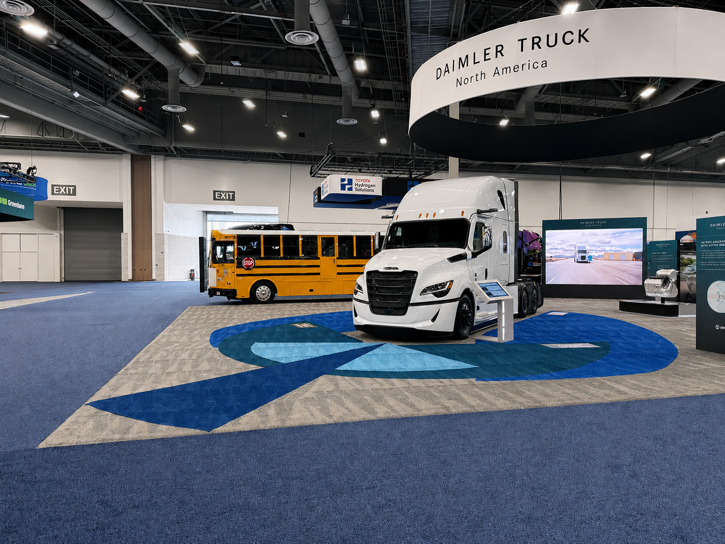 Daimler Truck exhibit with custom blue and gray flooring